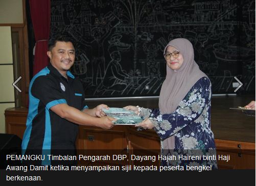 Penyampaian sijil kepada peserta, fasilitator bengkel 2.JPG